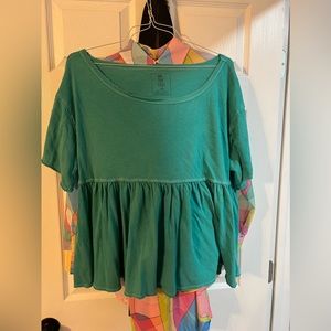 Green ruffled shirt!